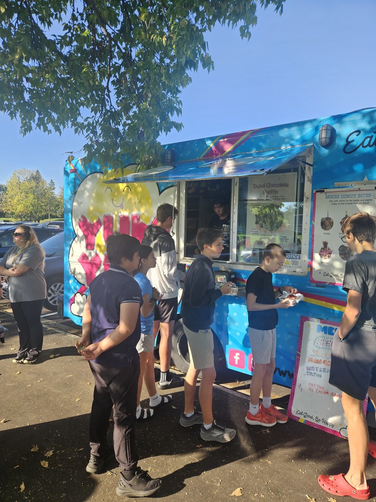 students ordering at a food truck