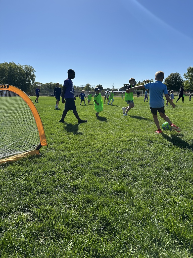 kids playing a mini soccer game