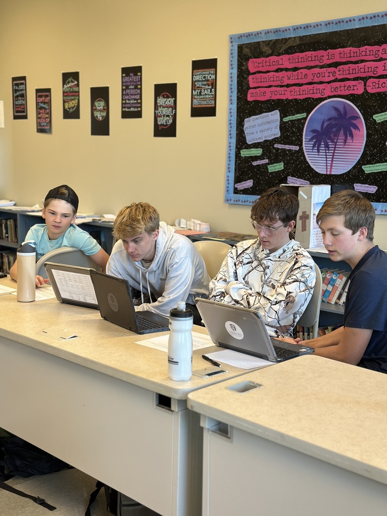 students of the jury in a mock trial deliberating