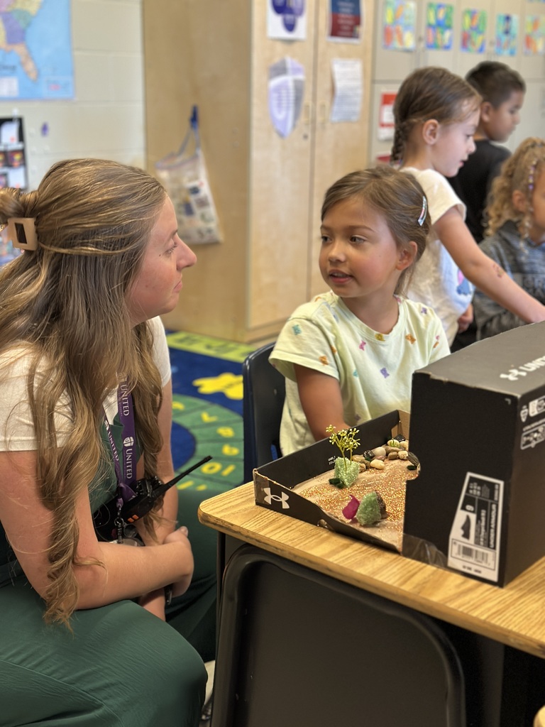 2nd grade students sharing facts about the habitat projects they created