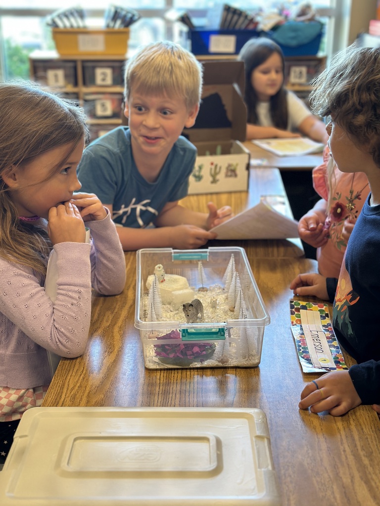 2nd grade students sharing facts about the habitat projects they created