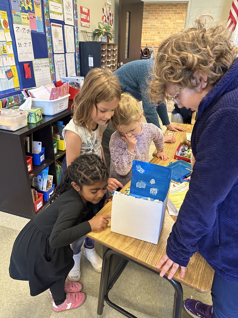 2nd grade students sharing facts about the habitat projects they created