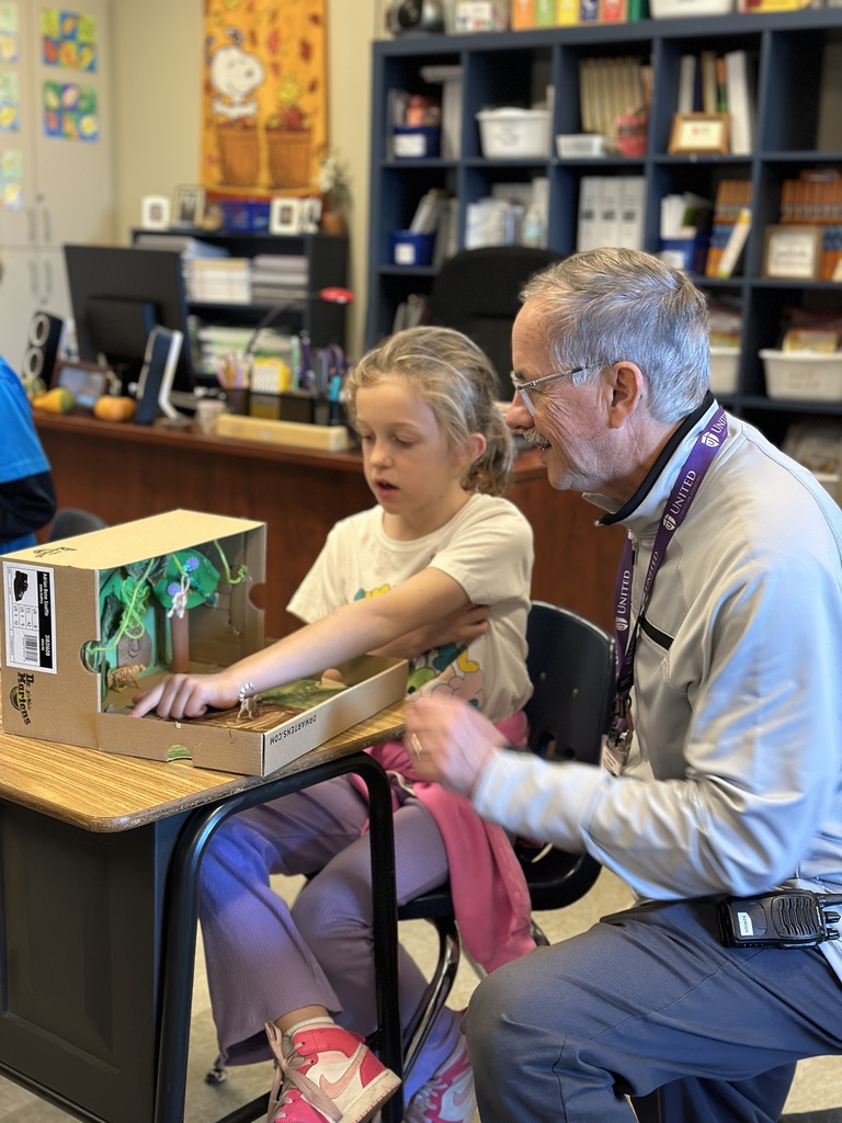 2nd grade students sharing facts about the habitat projects they created
