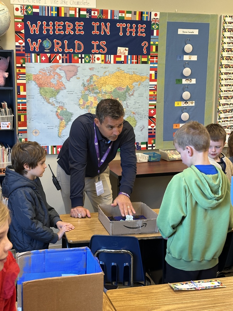 2nd grade students sharing facts about the habitat projects they created
