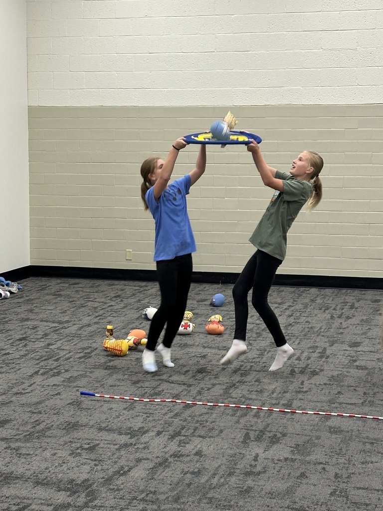 6th graders participating in a team building game
