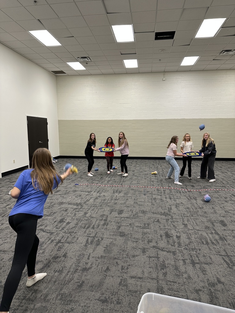 6th graders participating in a team building game