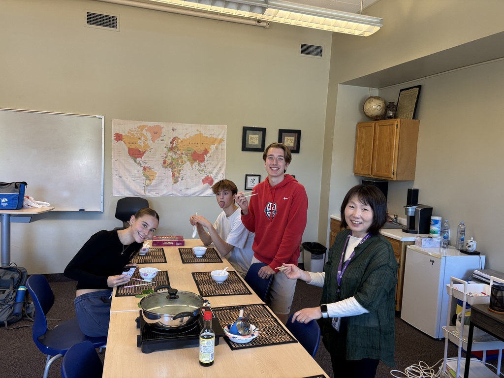 Chinese students tasting Hot Pot