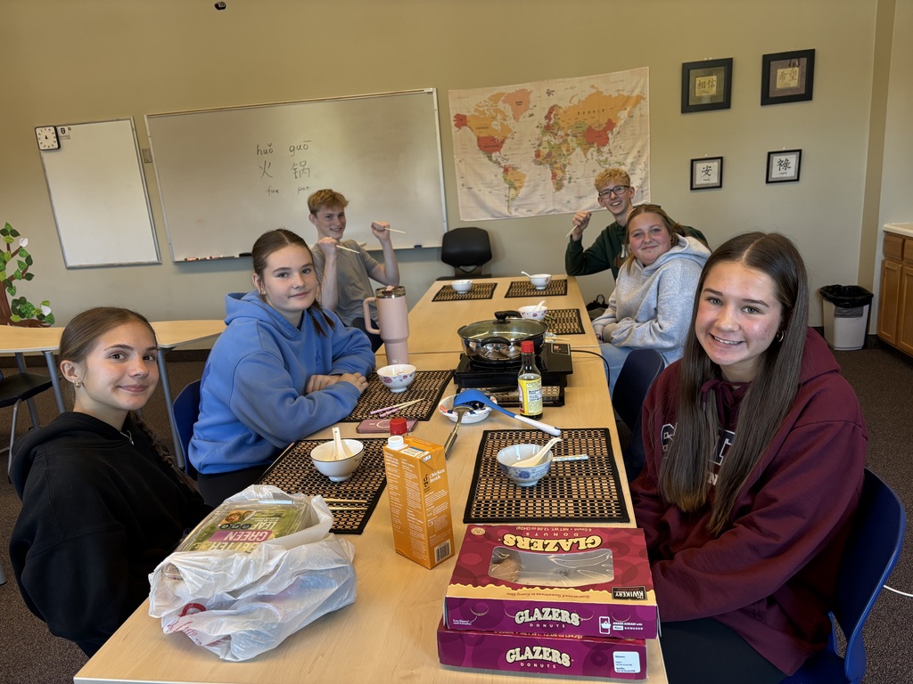 Chinese students tasting Hot Pot