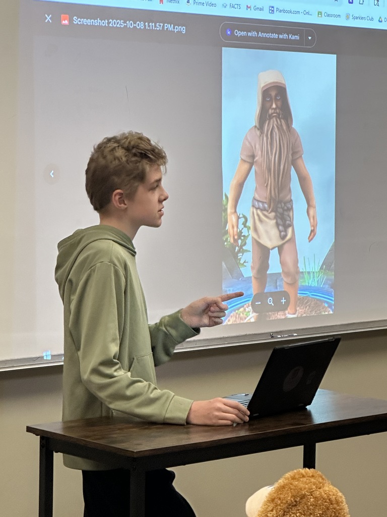 one student presenting in front of the class