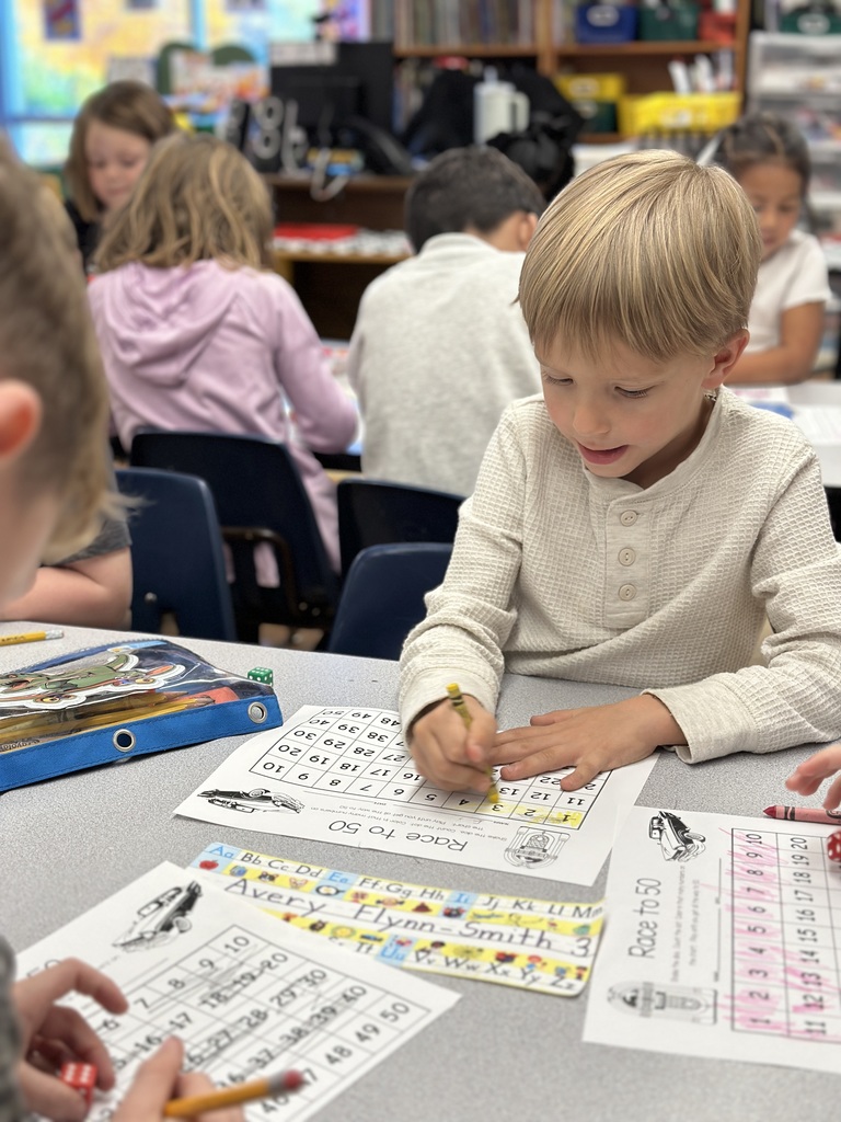 student working at his desk