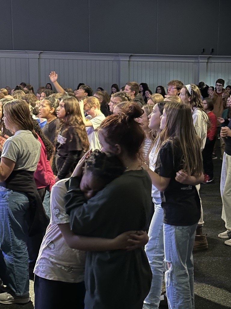 groups of students praying together
