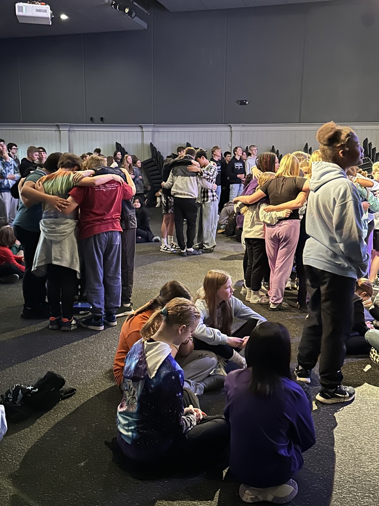 groups of students praying together