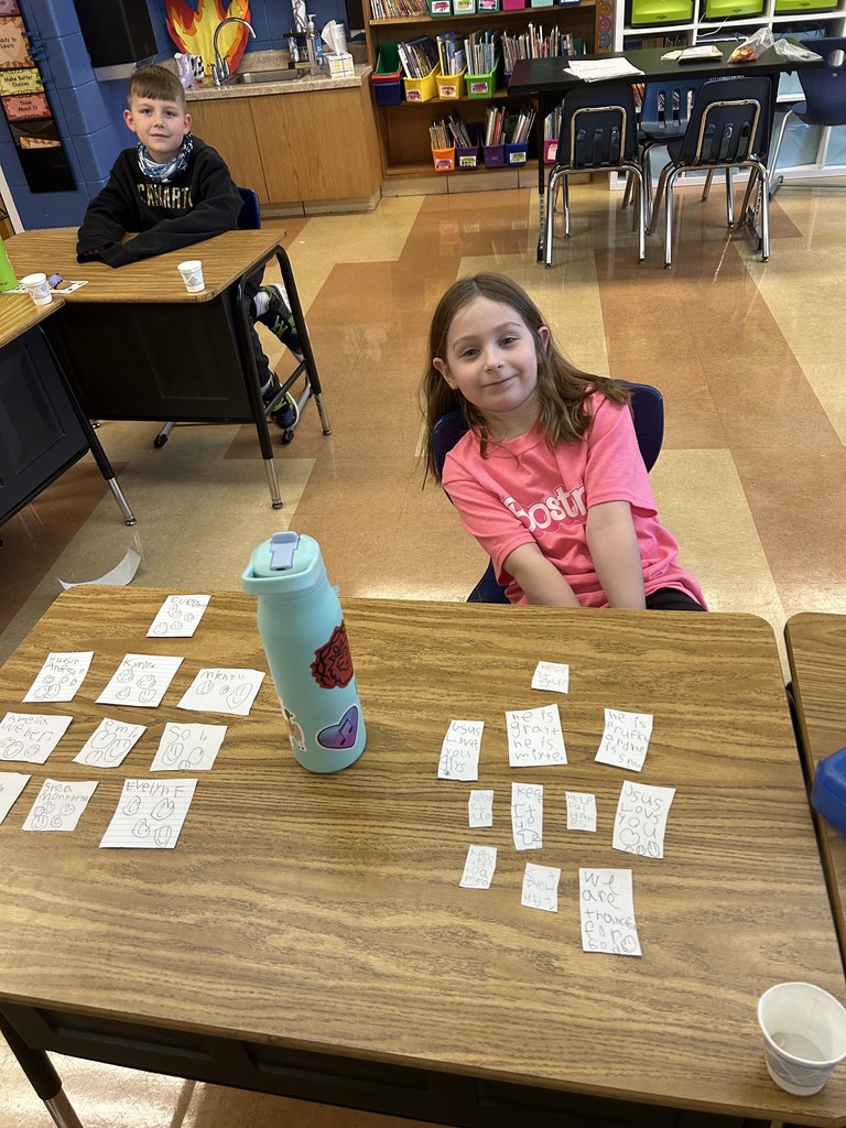 1st grade students practicing being producers and consumers