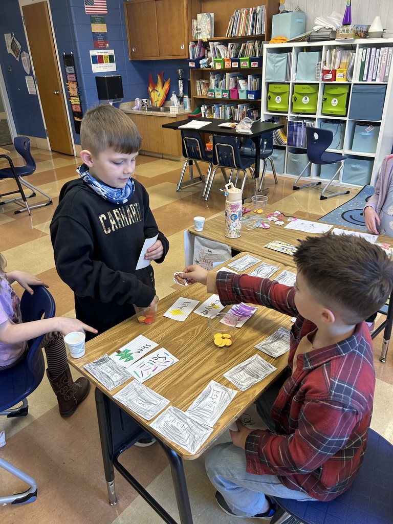 1st grade students practicing being producers and consumers