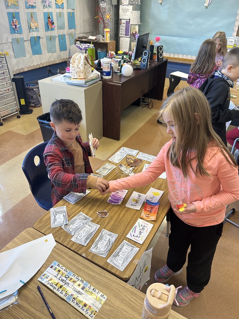 1st grade students practicing being producers and consumers