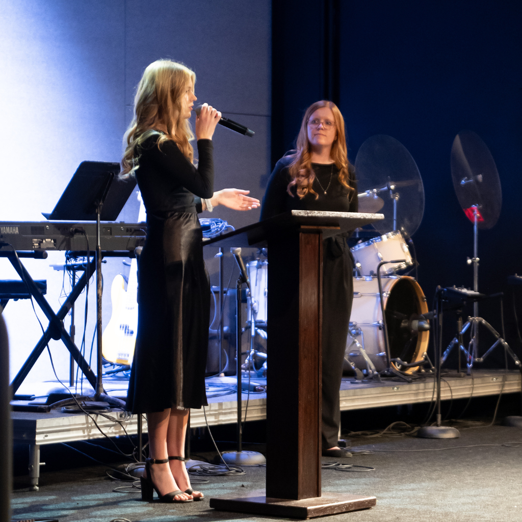 student giving a speech on stage