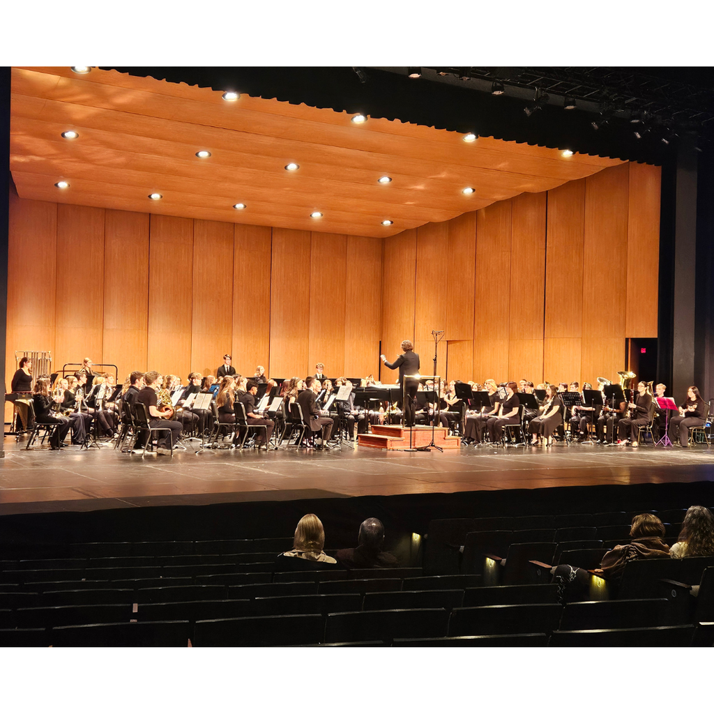 concert band on stage performing