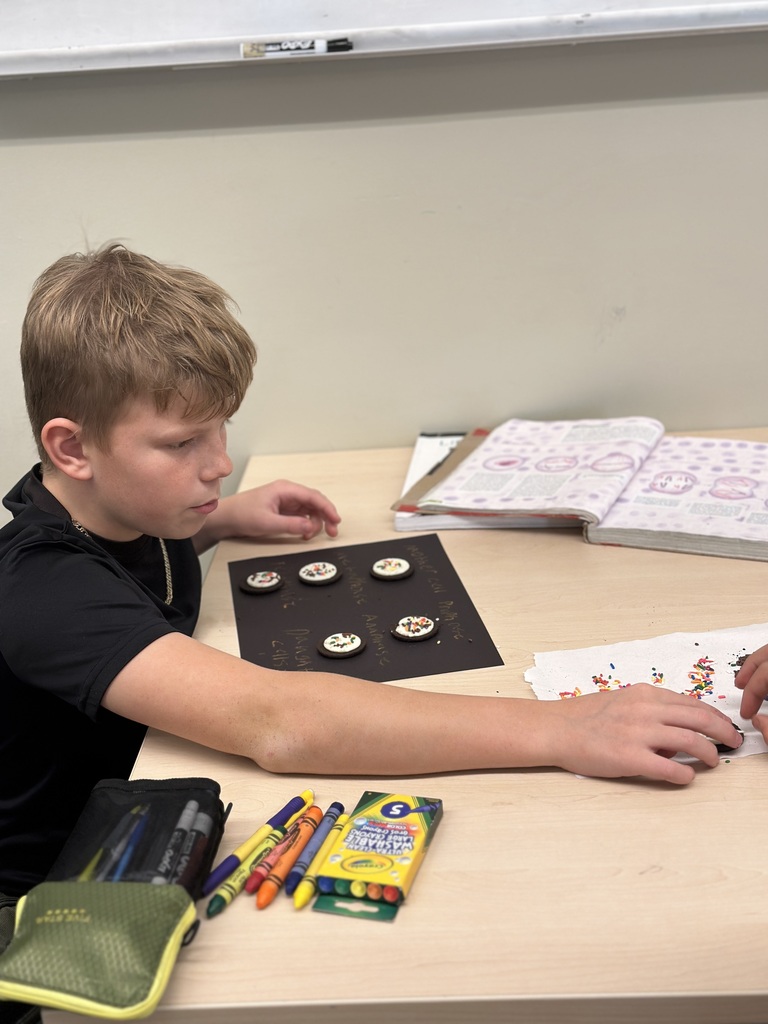 students using oreos and sprinkles for a cell mitosis lab
