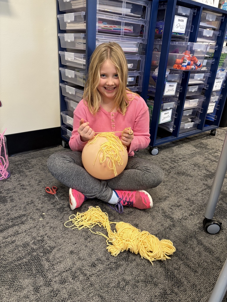 students making a balloon float based off of the "Balloons Over Broadway" story