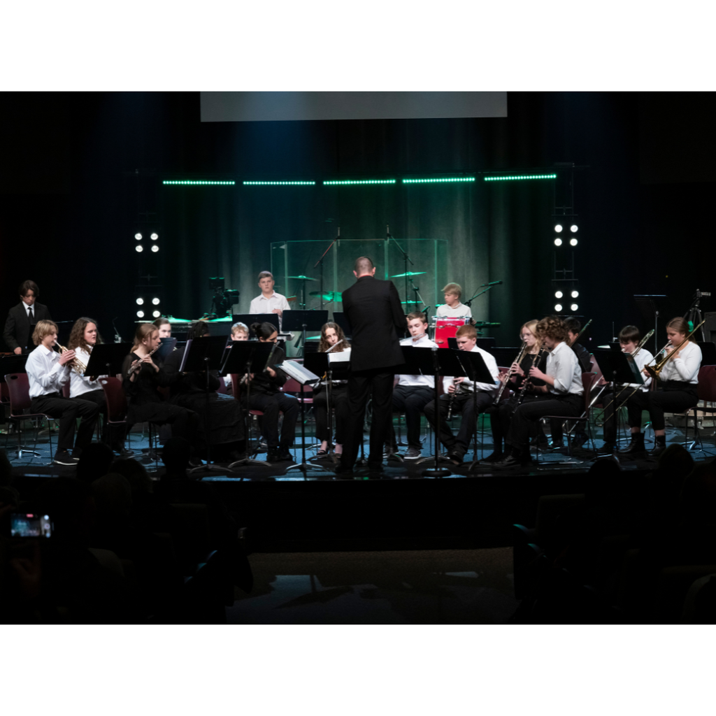 7th and 8th grade band students performing during Christmas concert