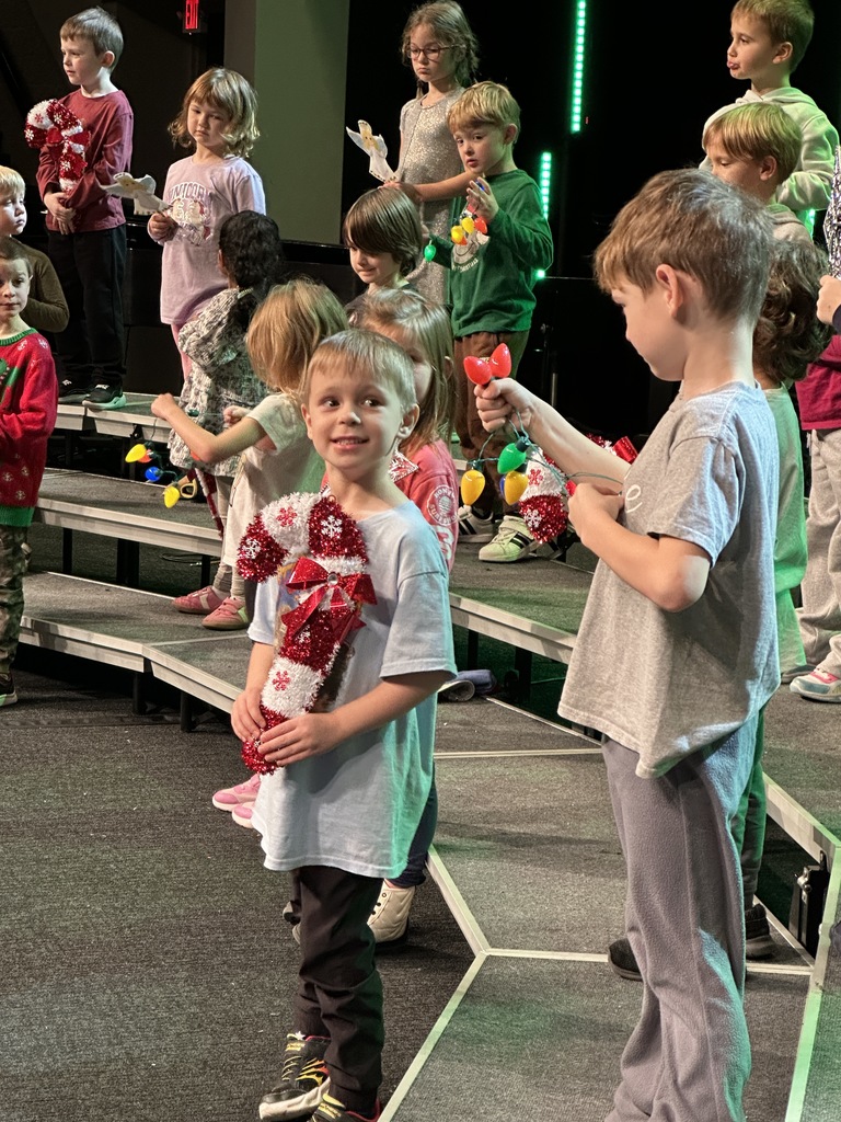 students singing on stage