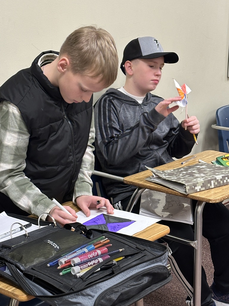 students creating windmills in Chinese class