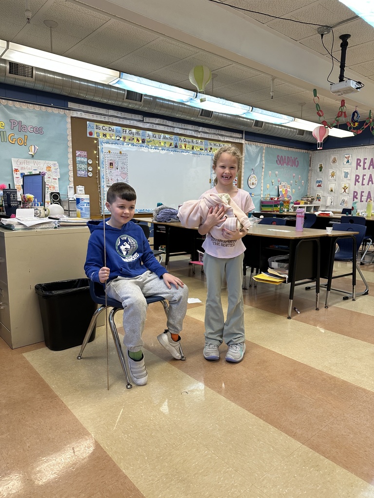a girl acting as Mary and a boy acting as Cesar Agustus