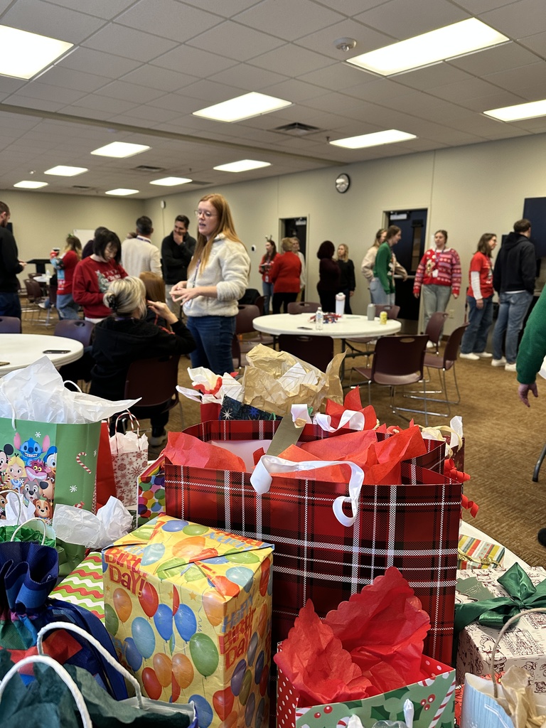 staff members mingling at a Christmas party