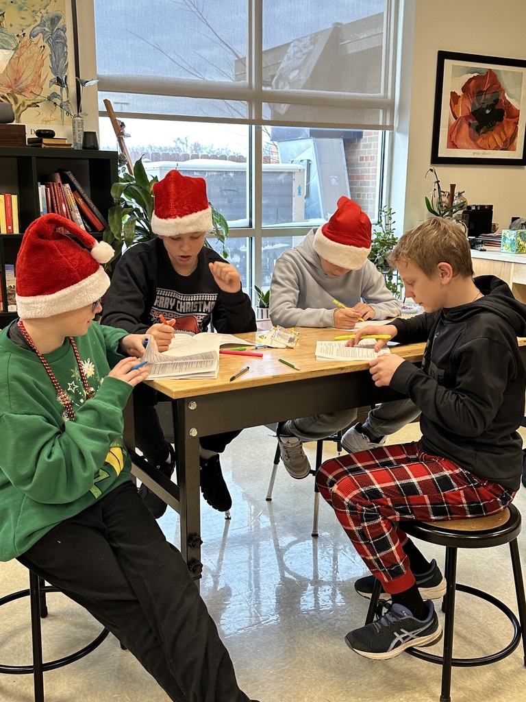 group of boys reading their scripts