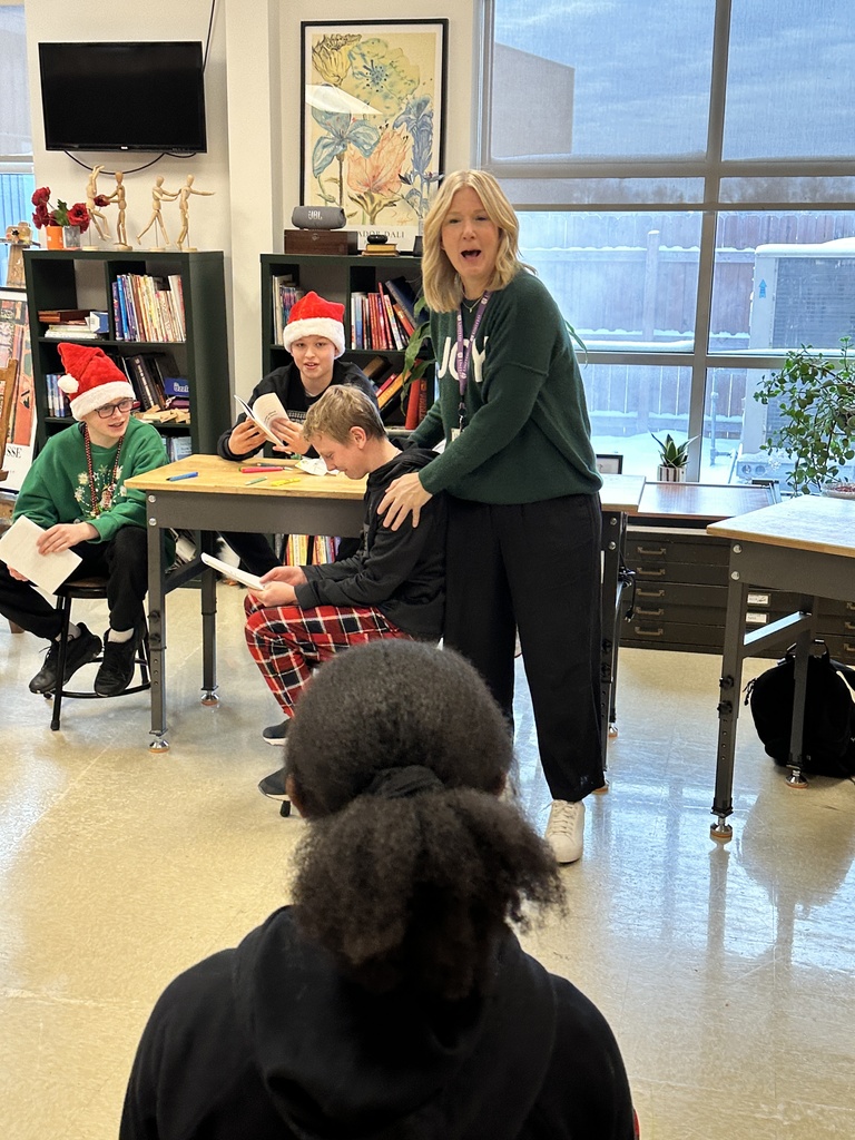 teacher laughing with a student