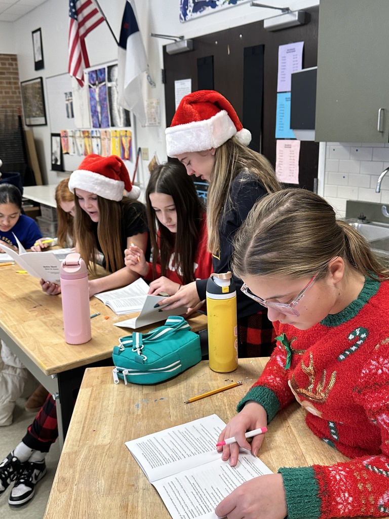 group of girls reading their scripts
