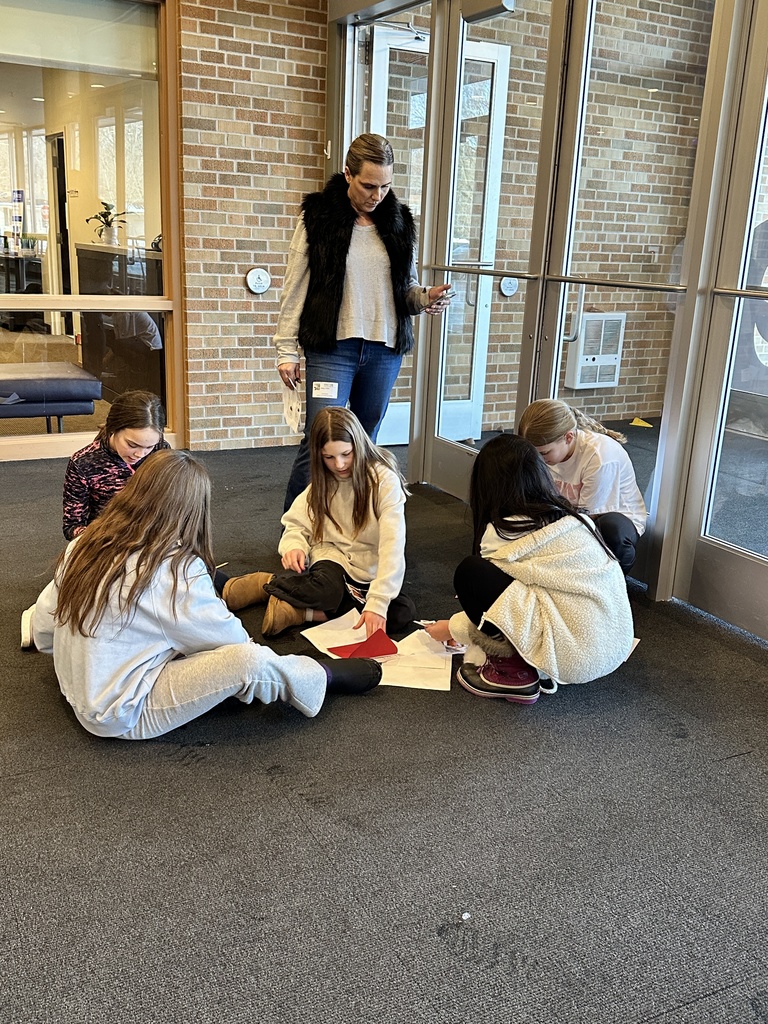 group of students sitting out of a fur trade simulation for being struck with measles