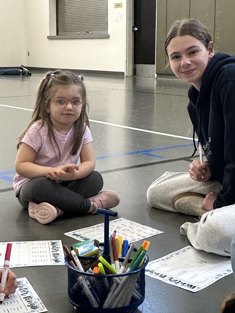 two students, one big buddy and one little buddy, smiling for the picture
