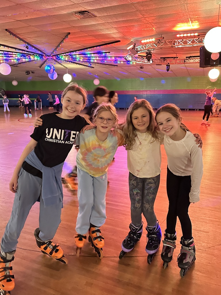 group of fourth grade girls at a roller skating rink