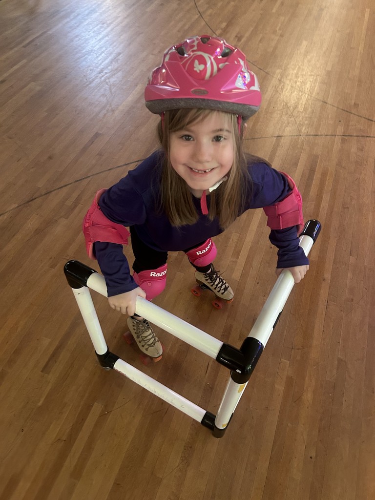 first grade girl roller skating