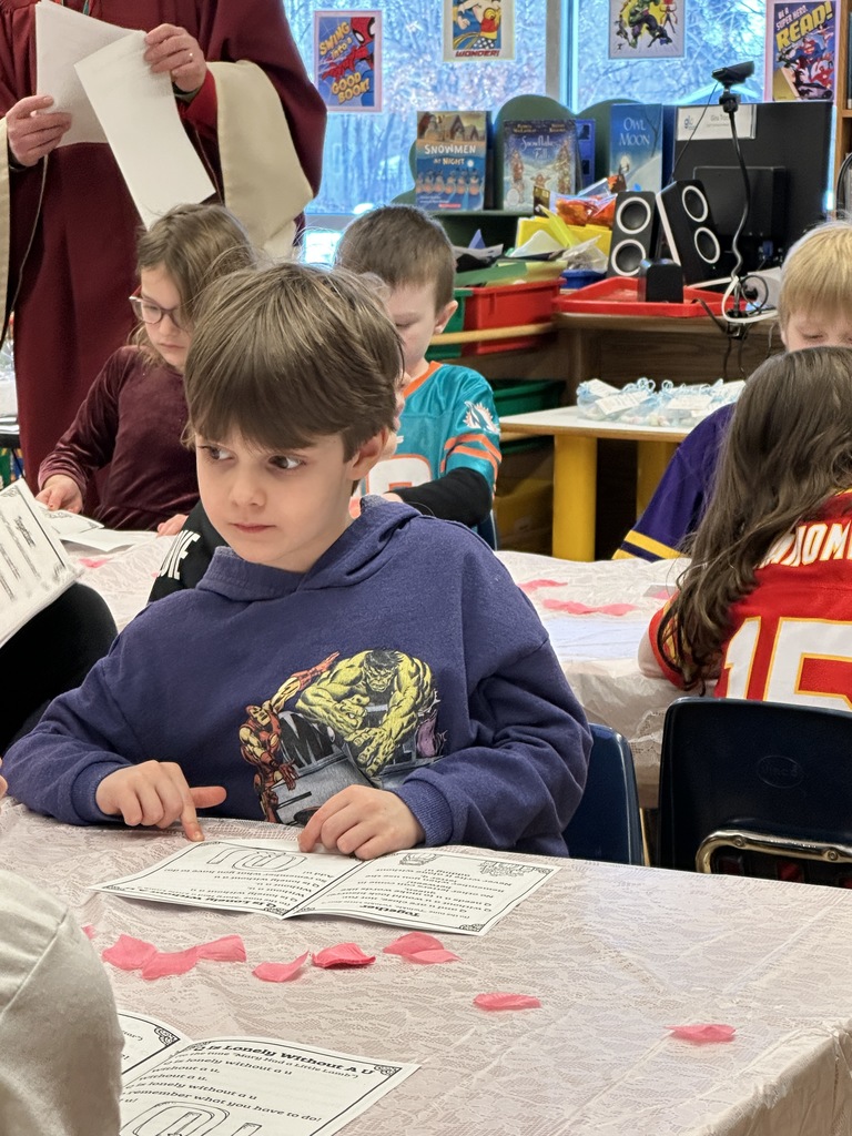 kindergarten students having a fake wedding ceremony for the letters Q and U