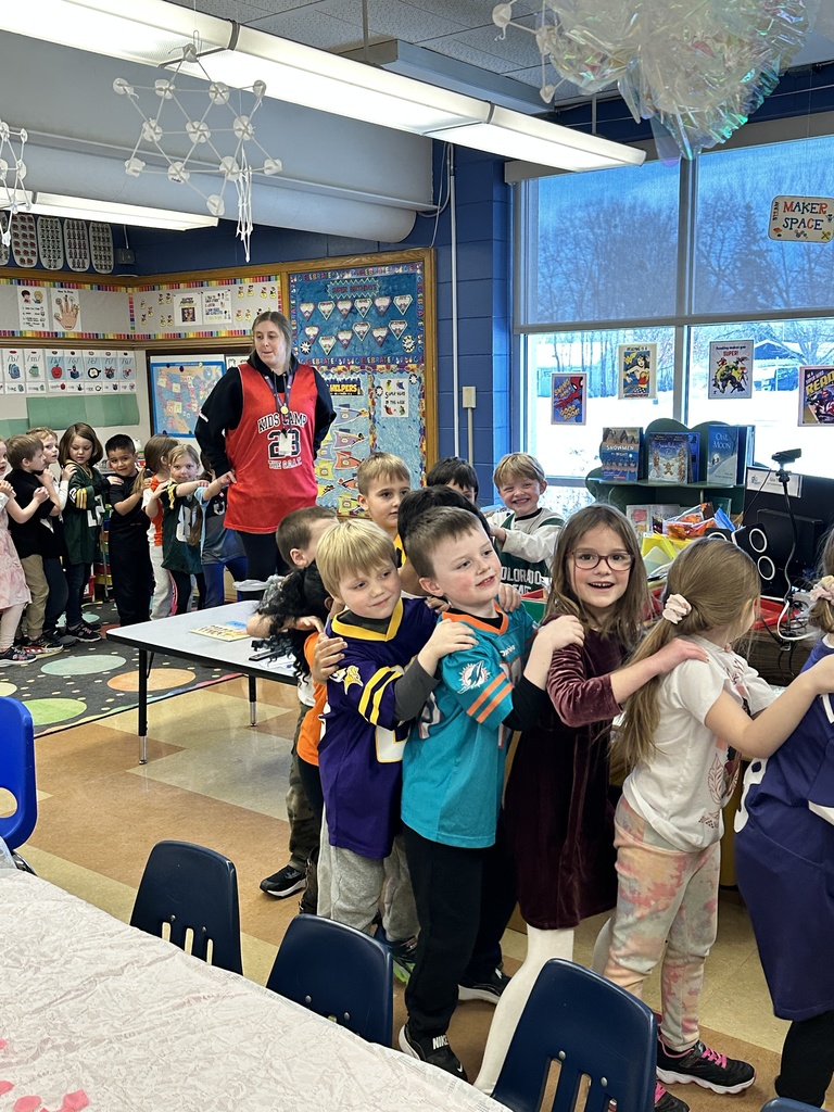kindergarten students lined up doing the bunny hop
