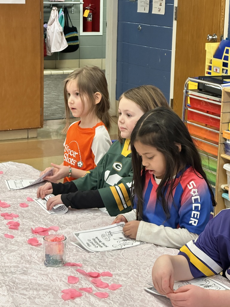 kindergarten students having a fake wedding ceremony for the letters Q and U