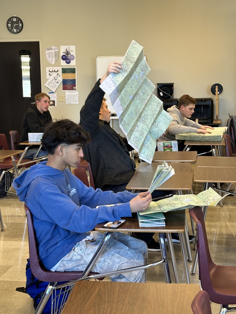 students studying aviation airspace maps