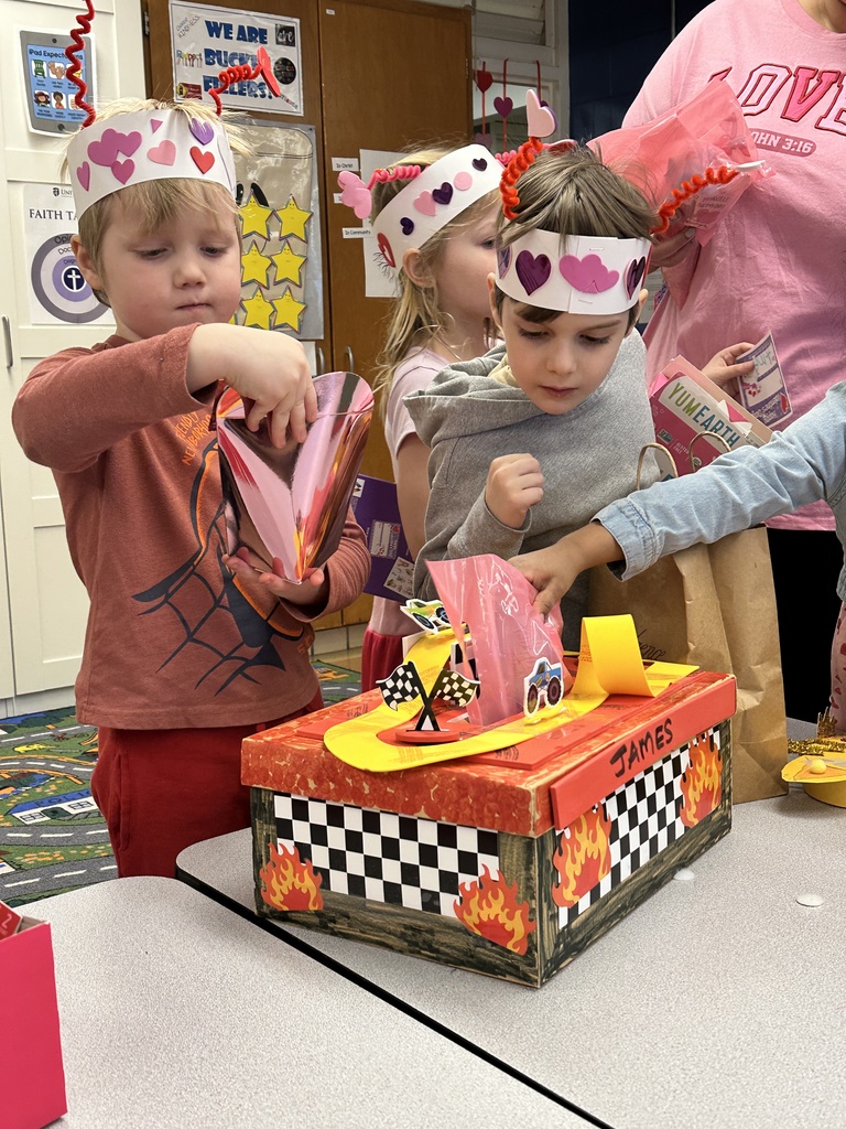 kindergarten students exchanging valentines