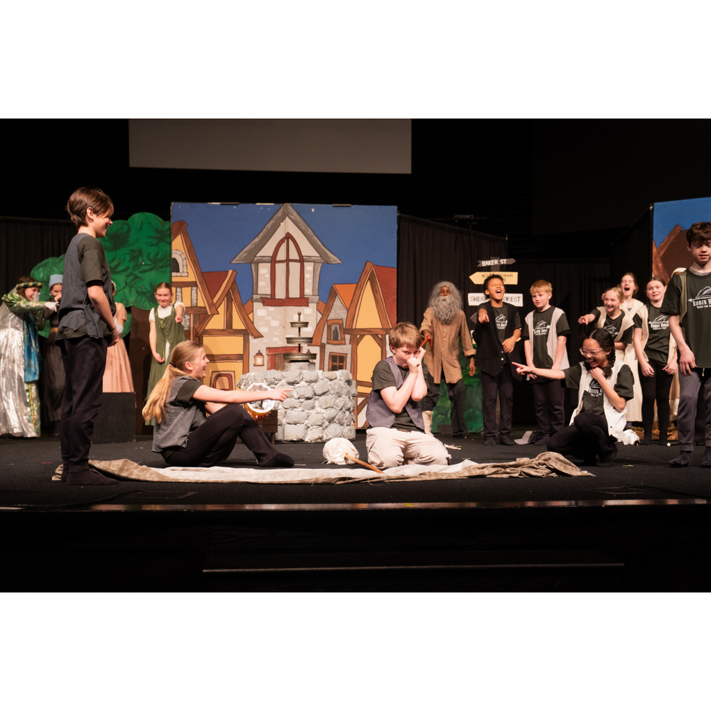 students acting in a Robin Hood play