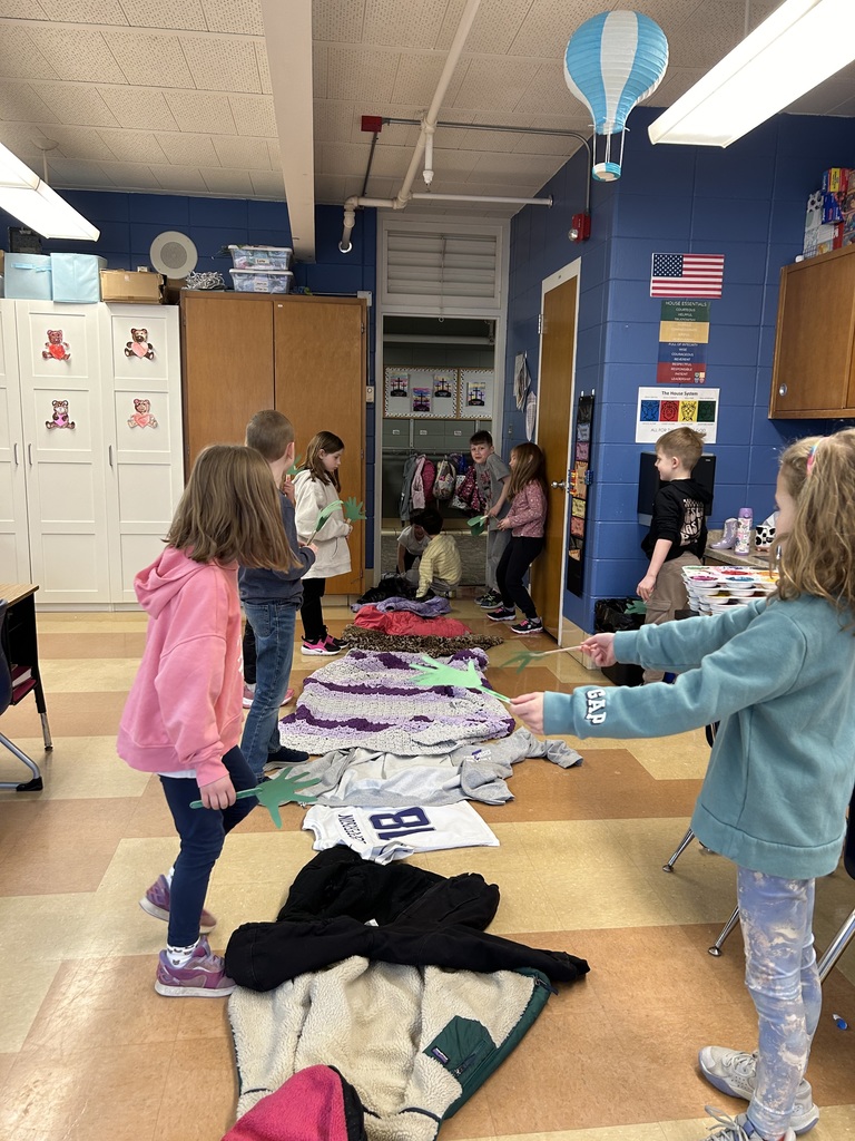 1st grade students reenacting palm sunday