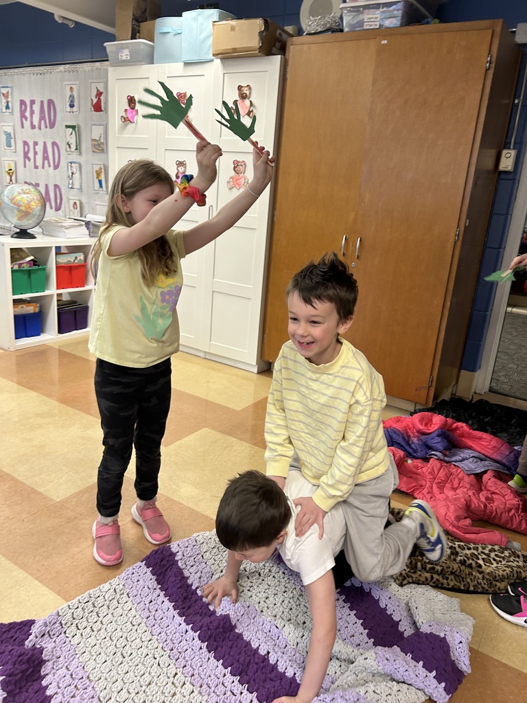 1st grade students reenacting palm sunday