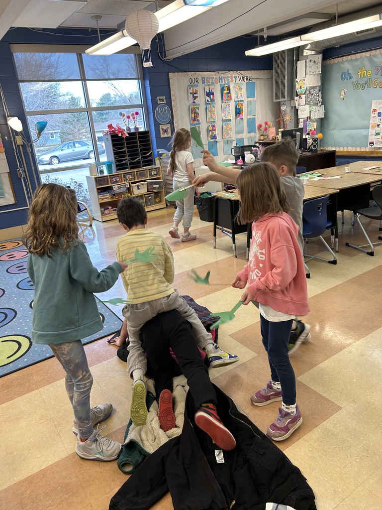 1st grade students reenacting palm sunday