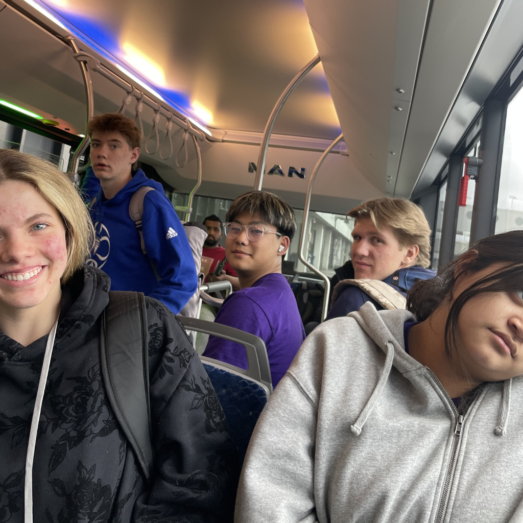 small group of high school students on a bus