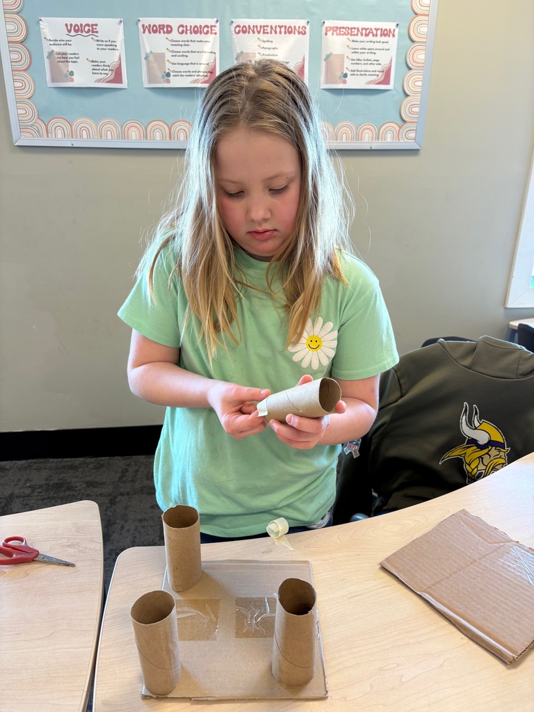 student working on an art project