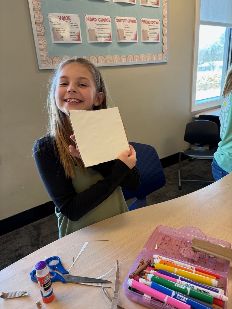 student working on an art project