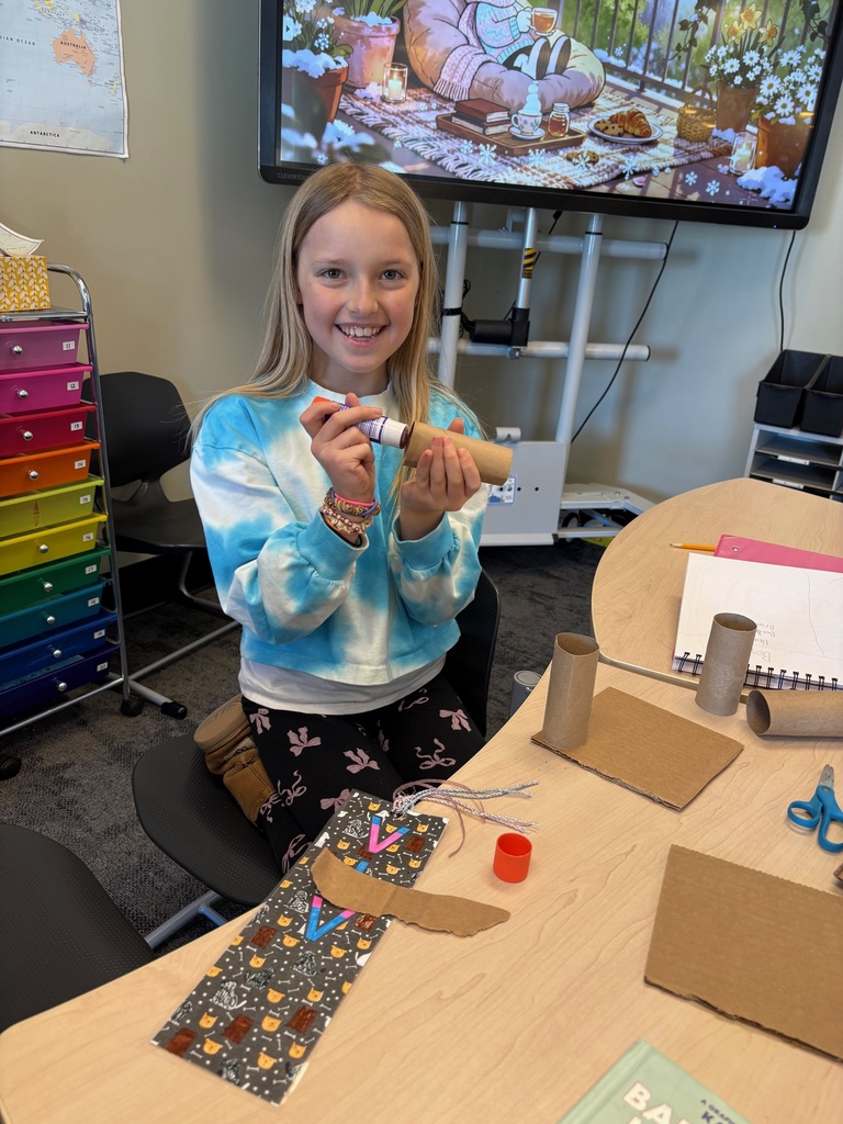 student working on an art project