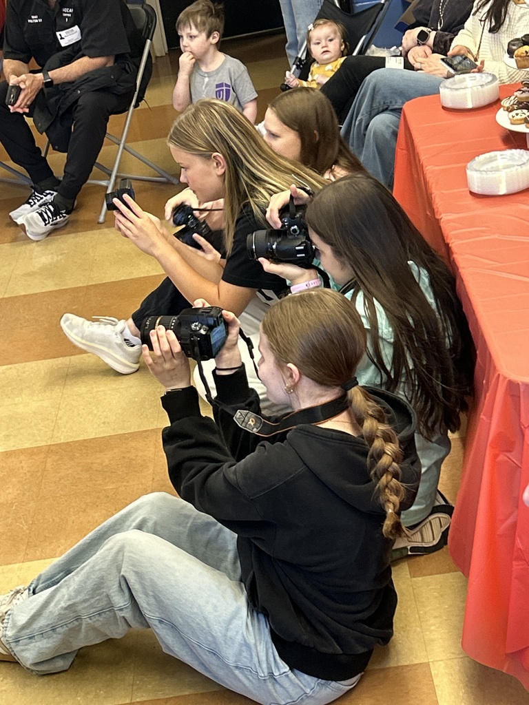 high school photography students acting as paparazzi