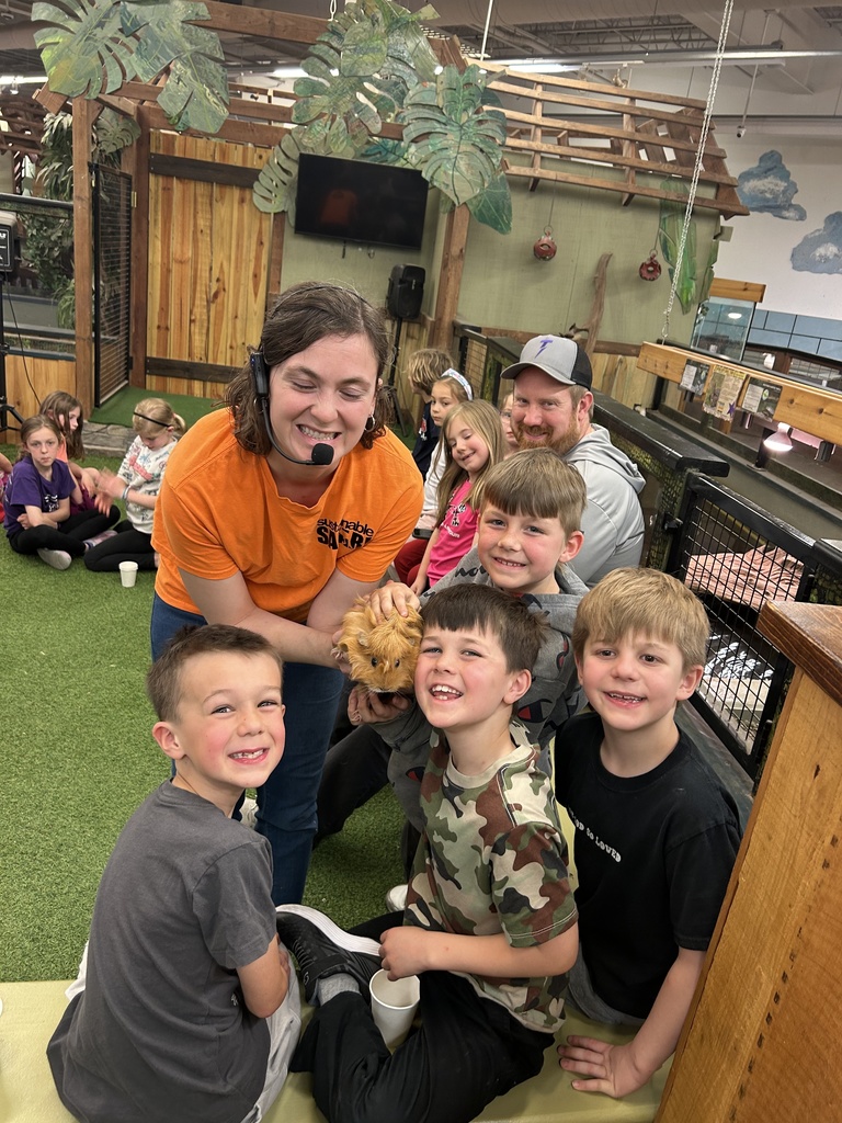 1st grade students at a petting zoo